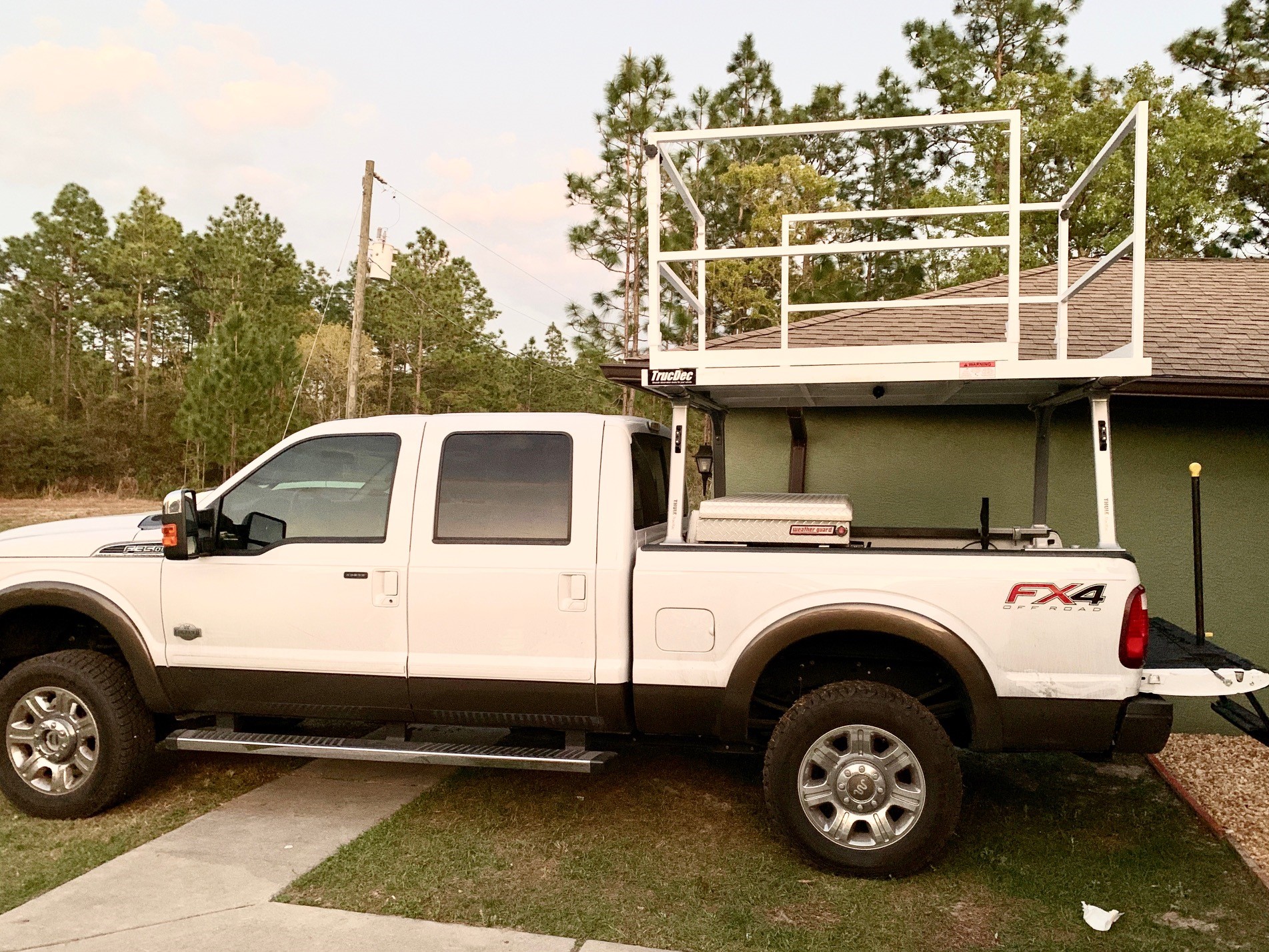 trucdec-white, trucdec, truedec, truck deck, made in usa, true deck, observation platforms, portable press box, portable guard platform, portable drone platform, rv roof deck, observation decks, work basket, drone launch pad, drone launch platform, truck platforms, filming platform, roof racks, truck bed platform